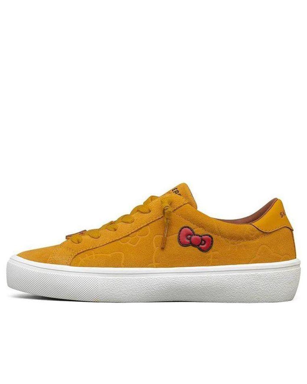 Women's Brown (Wmns) Goldie 2.0 X Hello Kitty 'Mustard'